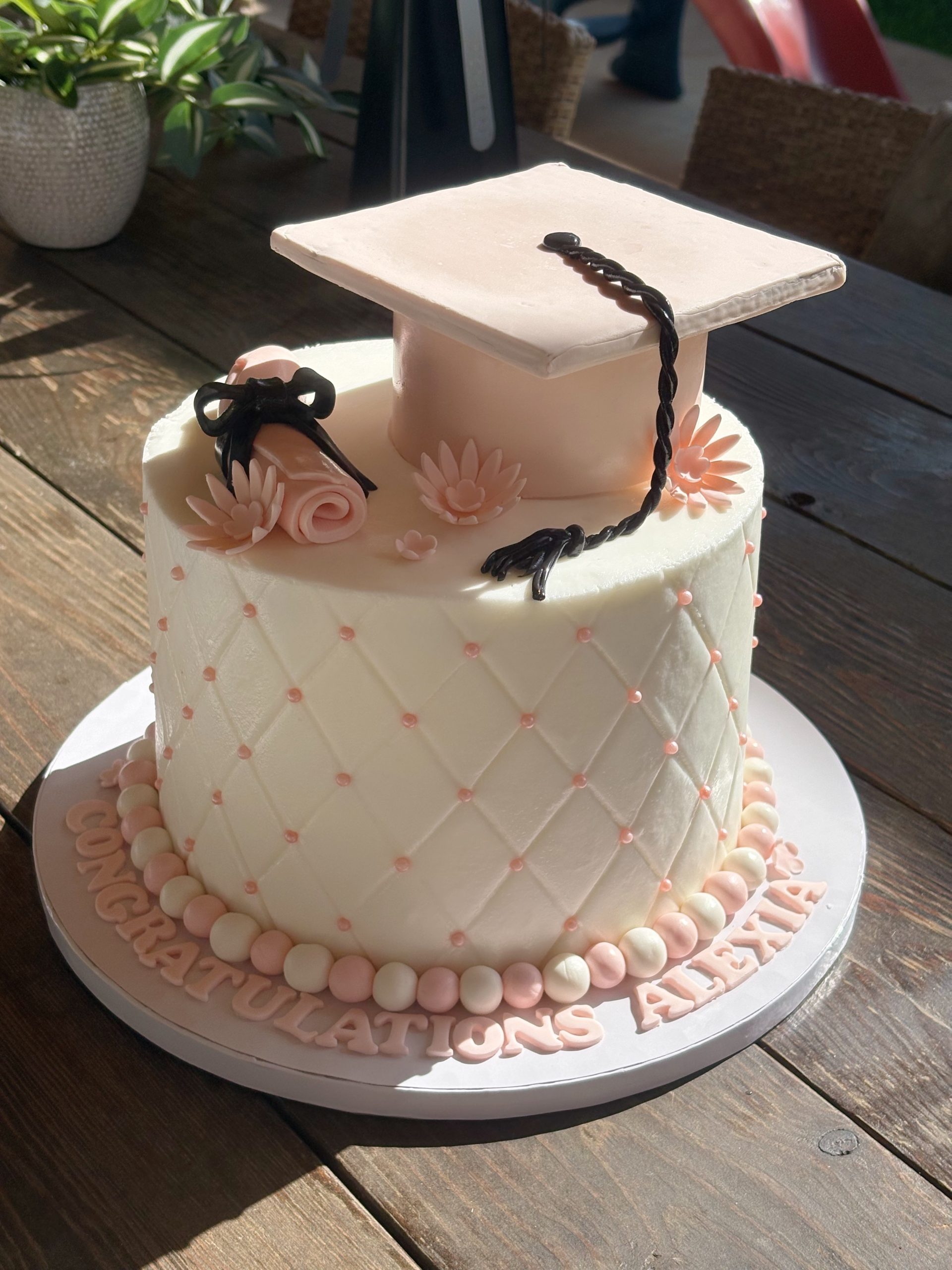 Sprinkle drip cake with teal frosting